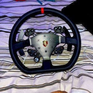 Porsche Forza xbox steering wheel 
Never used 
Need it gone 
And need some cash
